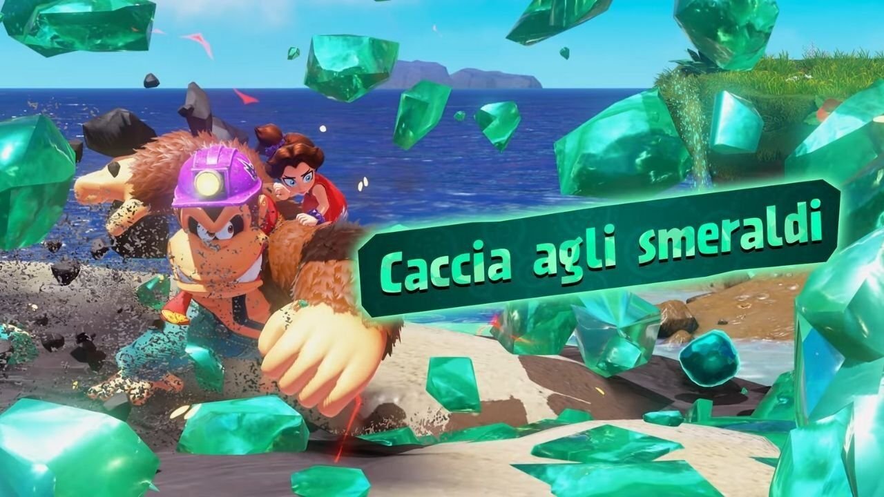 Donkey Kong e Pauline con un esplosione di smeraldi luminosi in evidenza sullo schermo e la scritta caccia agli smeraldi.