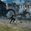 Screenshot di gameplay di Xenoblade Chronicles X: Definitive Edition su Nintendo Switch 2 che mostra il protagonista correre vicino a creature giganti e cascate sul pianeta Mira.